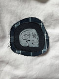 Skull linocut patch block print