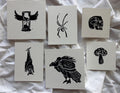 Hand carved death themed block prints - hourglass, skull, spider, bat, vulture, mushroom